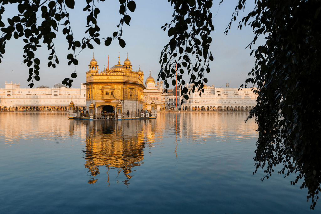 Golden Temple reflected in sacred water symbolizing balance, purity, and divine creation