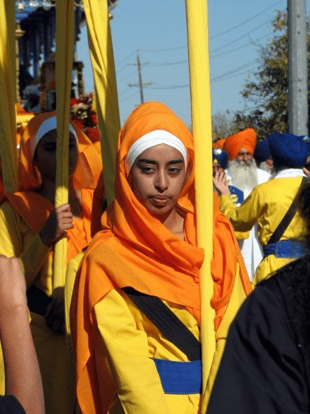 Sikh women participating in Khalsa procession representing discipline equality and spiritual strength