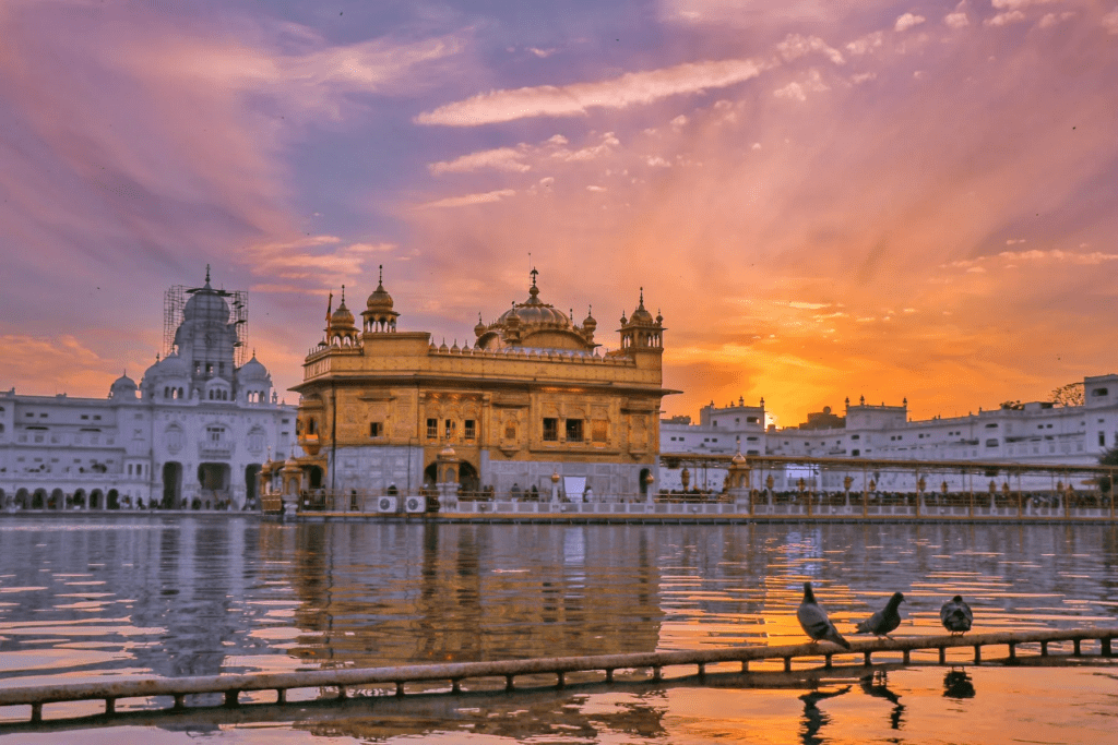 Golden Temple at sunset reflecting Sikh unity, peace, and spiritual harmony