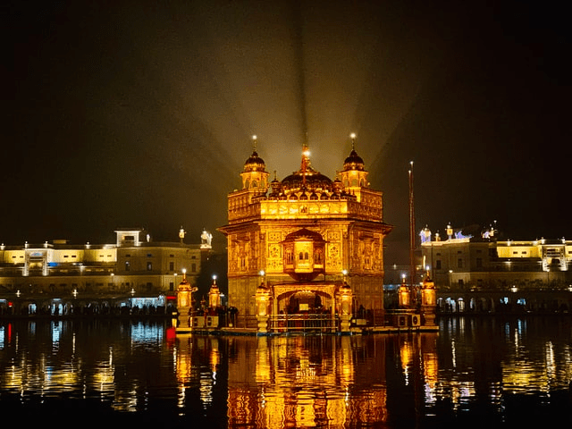 Golden Temple illuminated at night symbolizing Sikh devotion and eternal truth